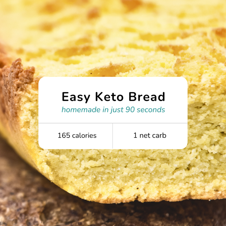 Close-up of a slice of 90-second keto bread showing its soft, fluffy interior and golden crust.